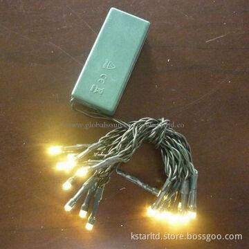 Battery string light with 10pcs warm white color LED, green wire, CE-/RoHS-certified